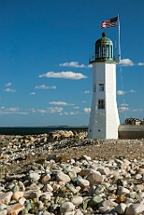 Scituate Light on Rocky Shore in Massachusetts